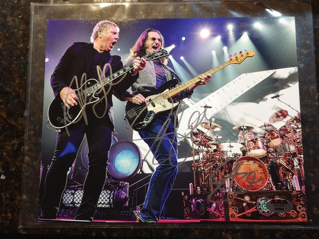 My personal Rush autographed picture from the R40 tour in 2015