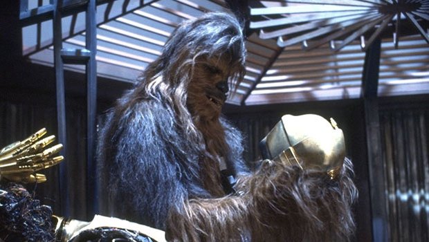 Chewie pieces Threepio back together again - Photo: Lucasfilm/Disney